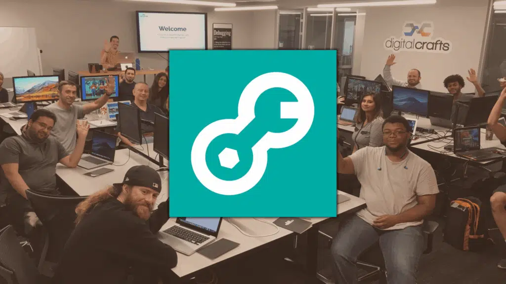 DigitalCrafts classroom with students at computers, smiling and raising hands during a coding session in a modern training space