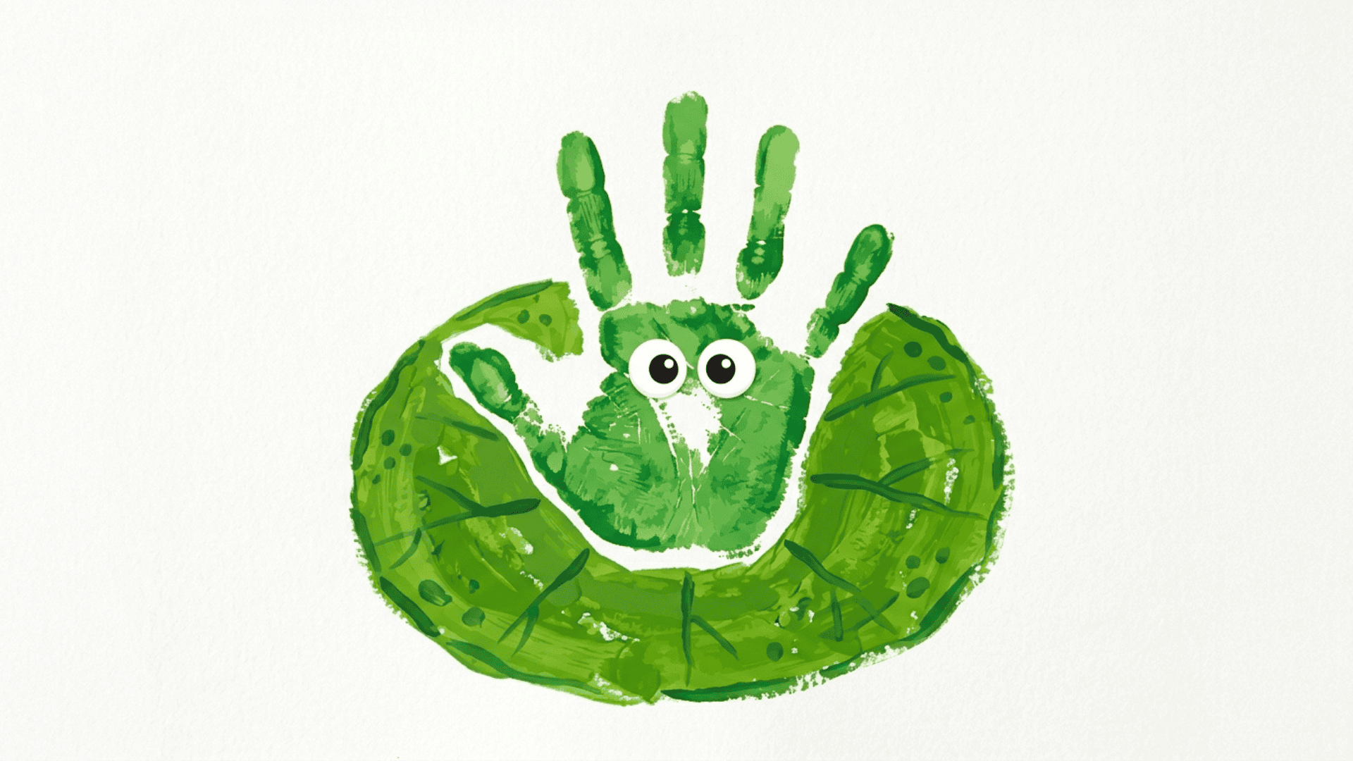handprint frog on a lily pad painting showing a green handprint frog sitting on a round painted green lily pad on white paper