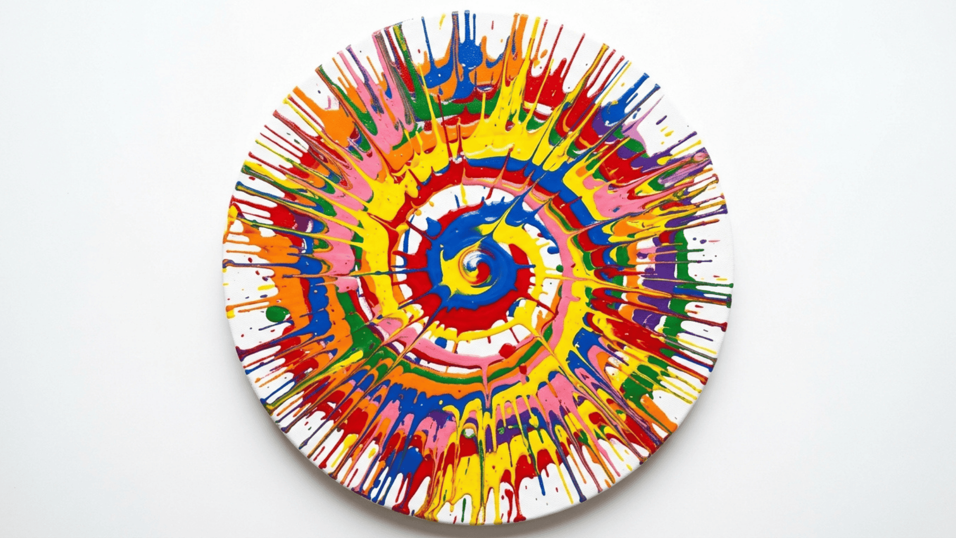 spin art painting with colorful paint splatters radiating from center on white background creating a vibrant circular design