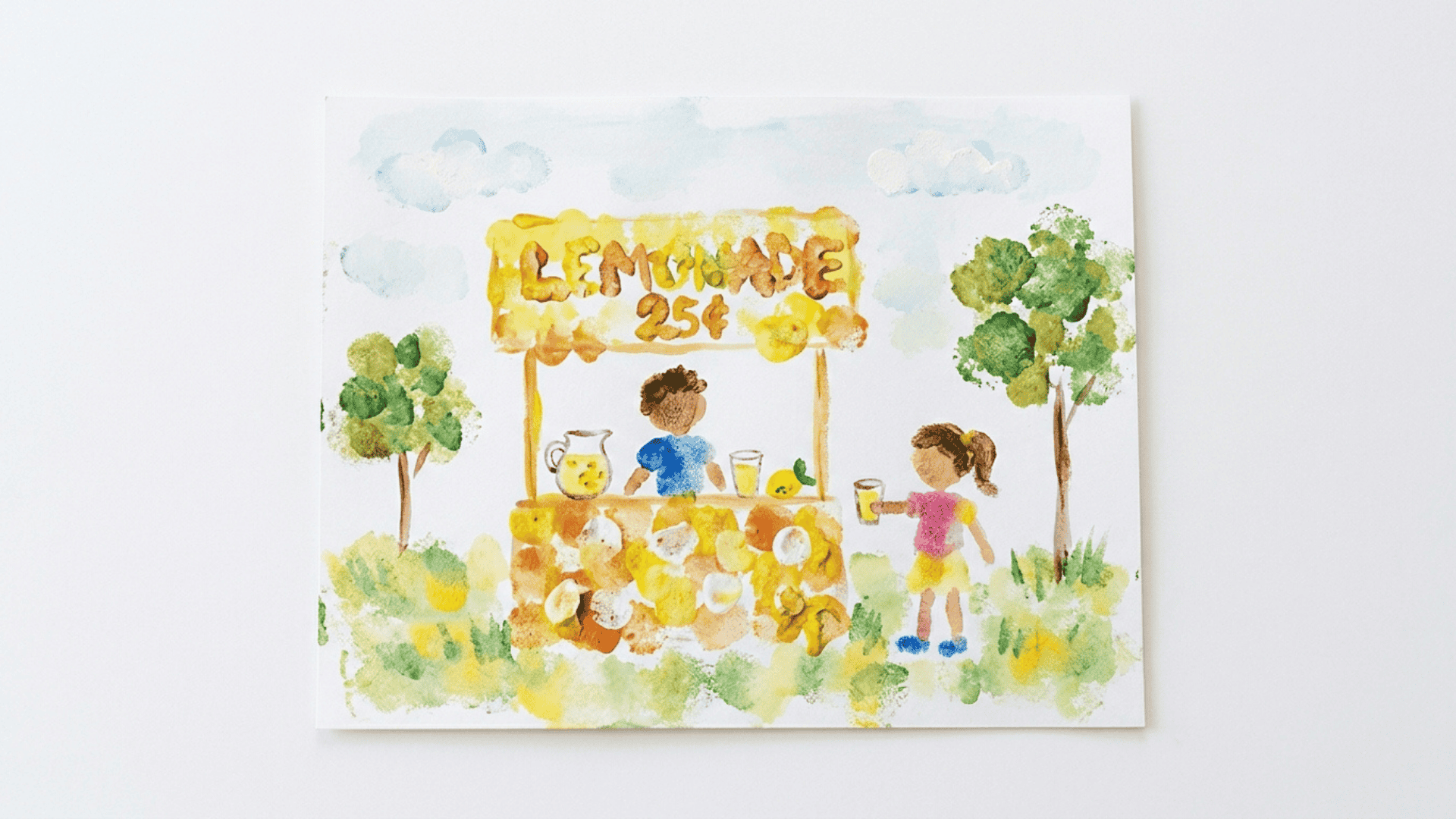 sponge painted lemonade art with yellow textured paint on white background showing soft dabbing patterns