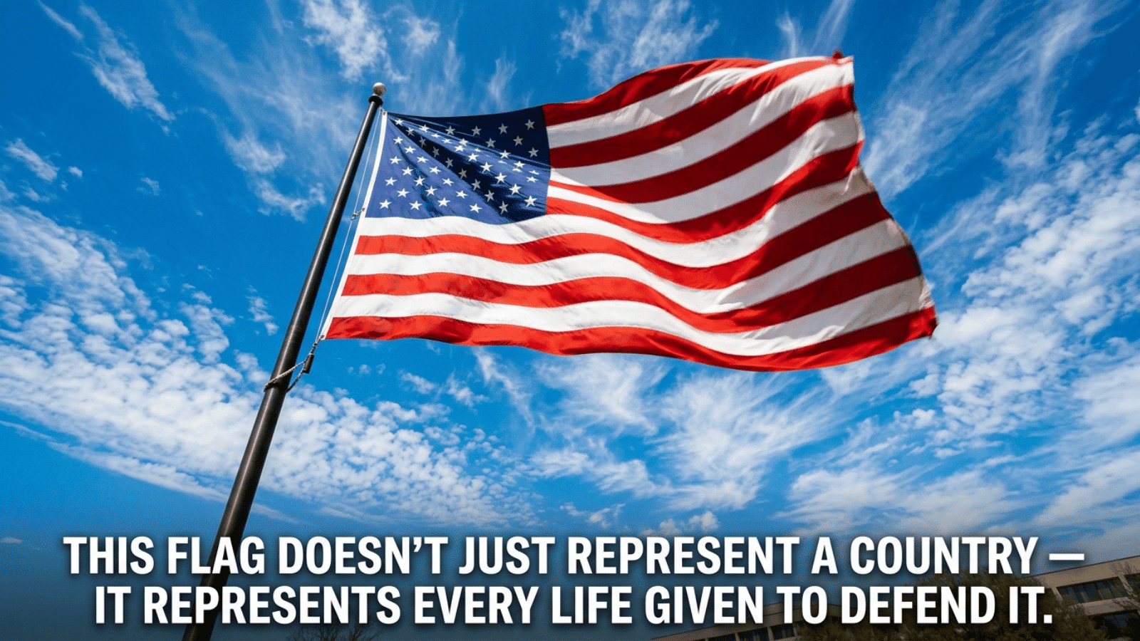 american flag waving against a bright blue sky with tribute text honoring lives sacrificed to defend the nation and freedom