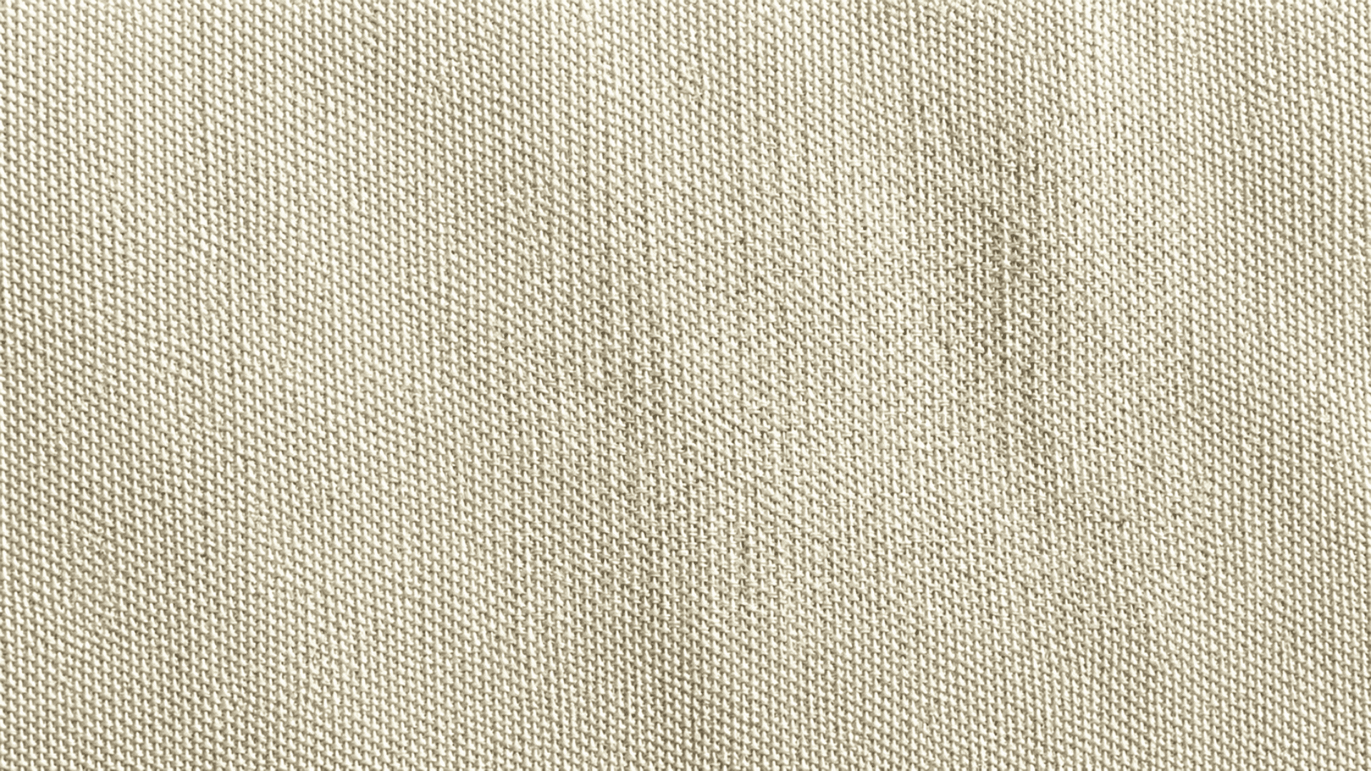 Duck Canvas fabric texture in natural beige with durable tight weave, ideal for upholstery, bags, crafts, and home decor.