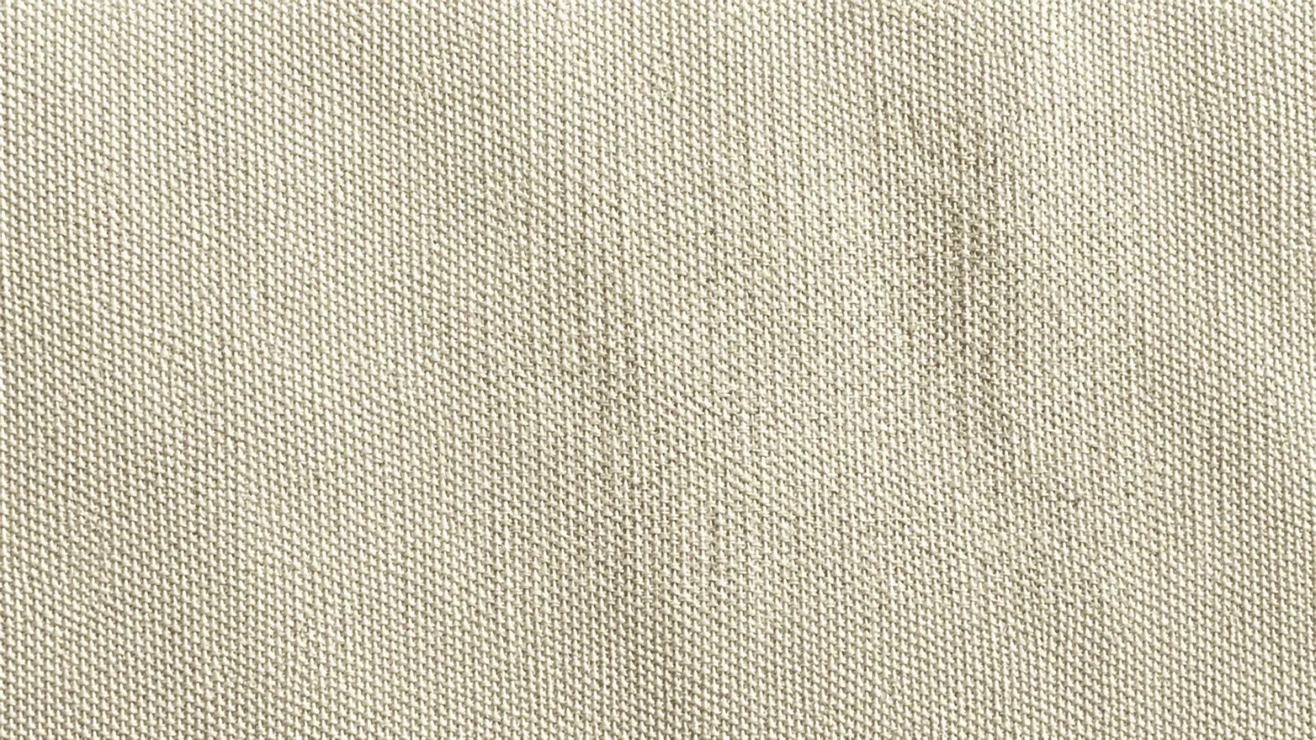 Duck Canvas fabric texture in natural beige with durable tight weave, ideal for upholstery, bags, crafts, and home decor.