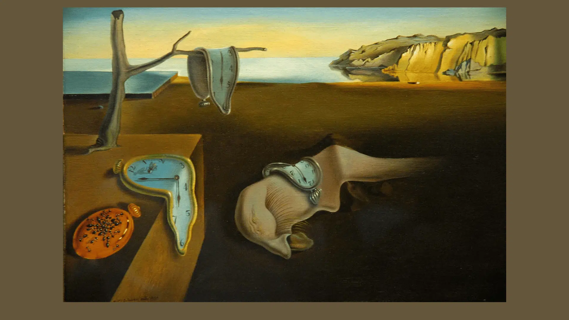 Salvador Dalí’s surreal painting The Persistence of Memory with melting clocks draped across a barren desert landscape.