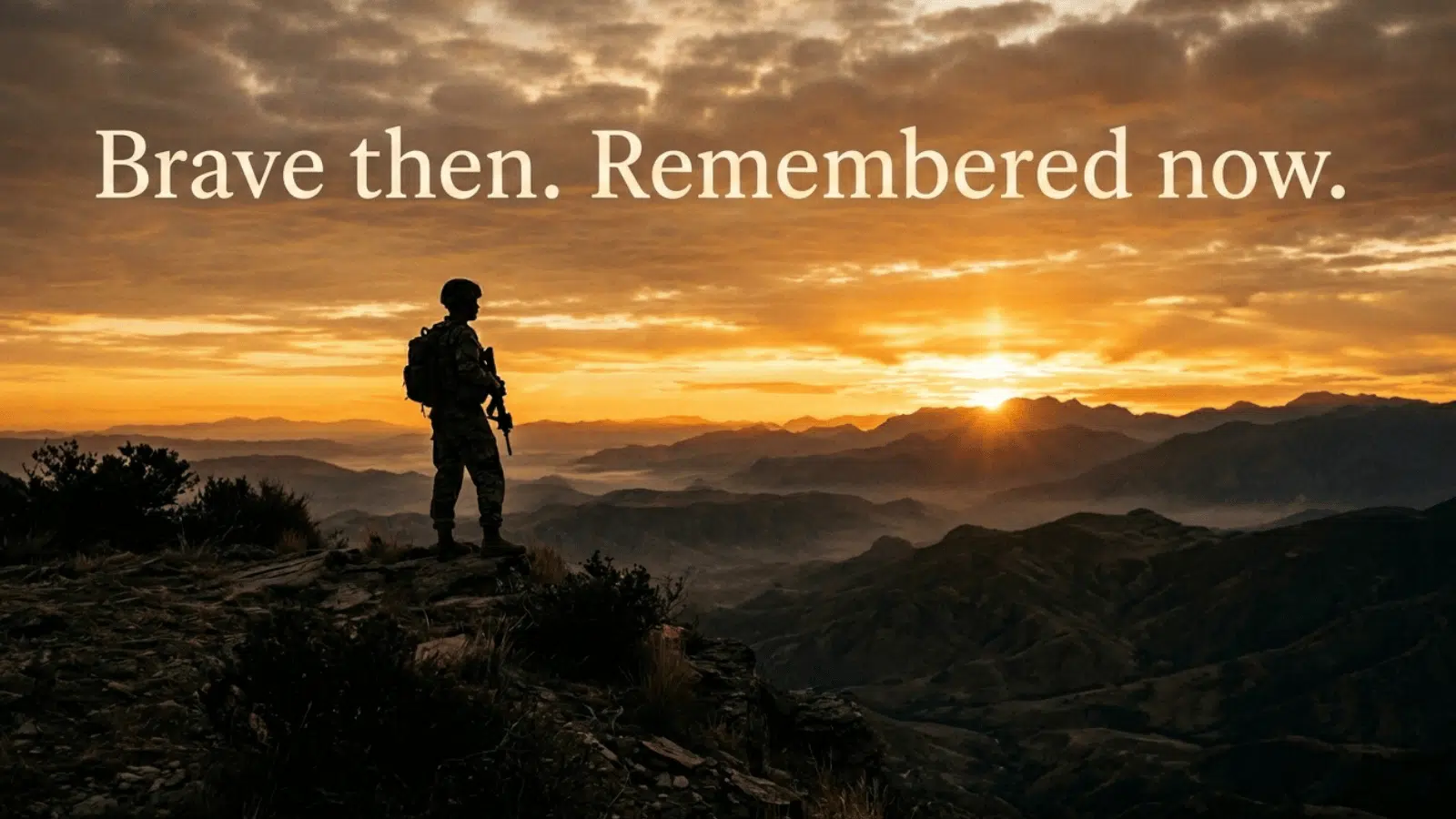 silhouette of soldier standing on mountain at sunrise with tribute text “Brave then. Remembered now.” honoring fallen heroes