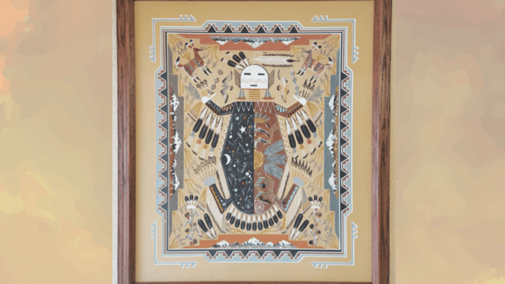 traditional navajo sand painting with sacred tribal figure and framed southwestern native american artwork