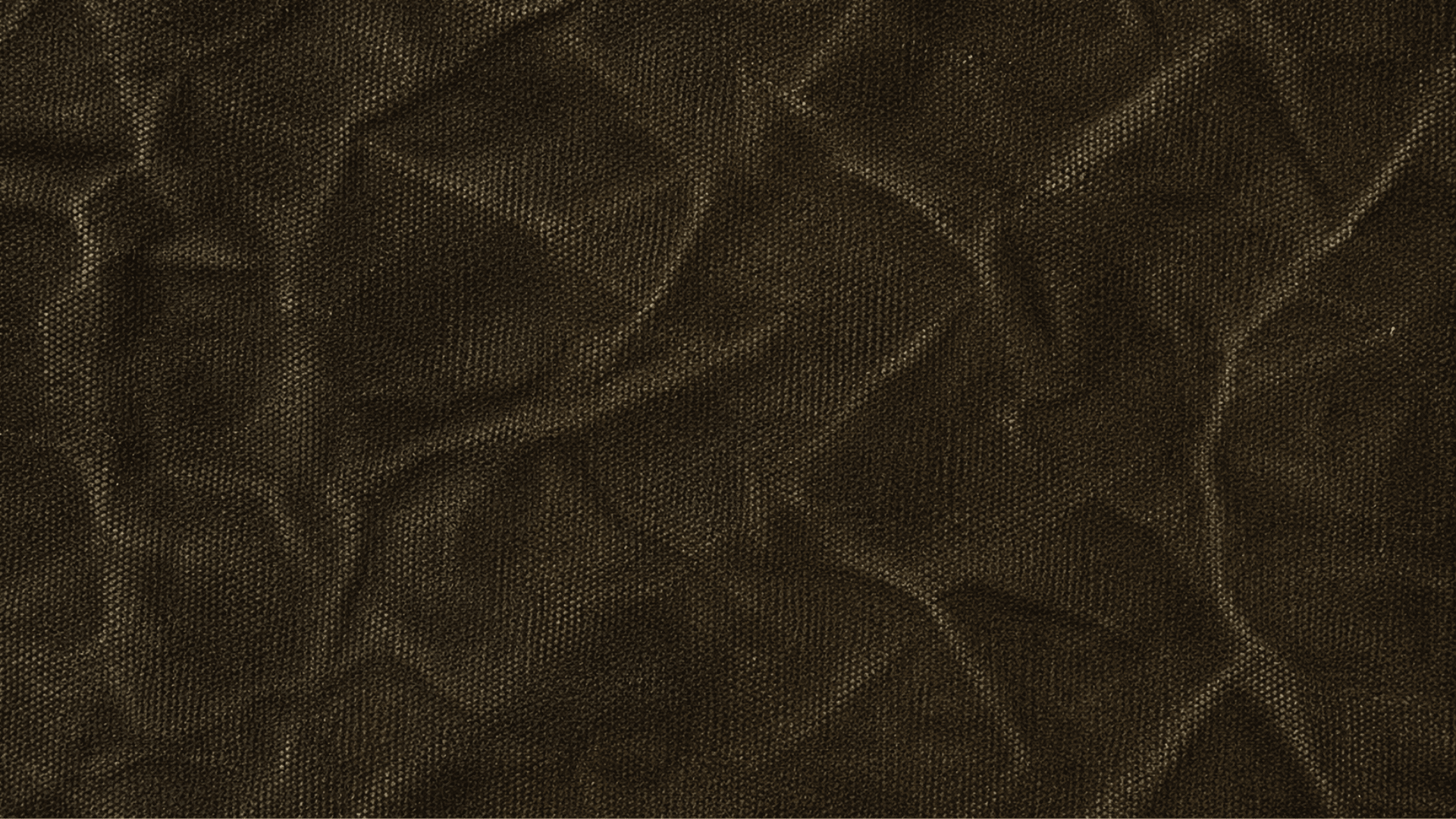 Waxed Canvas fabric texture in dark earthy tones with rugged weathered finish, ideal for bags, jackets, and upholstery.