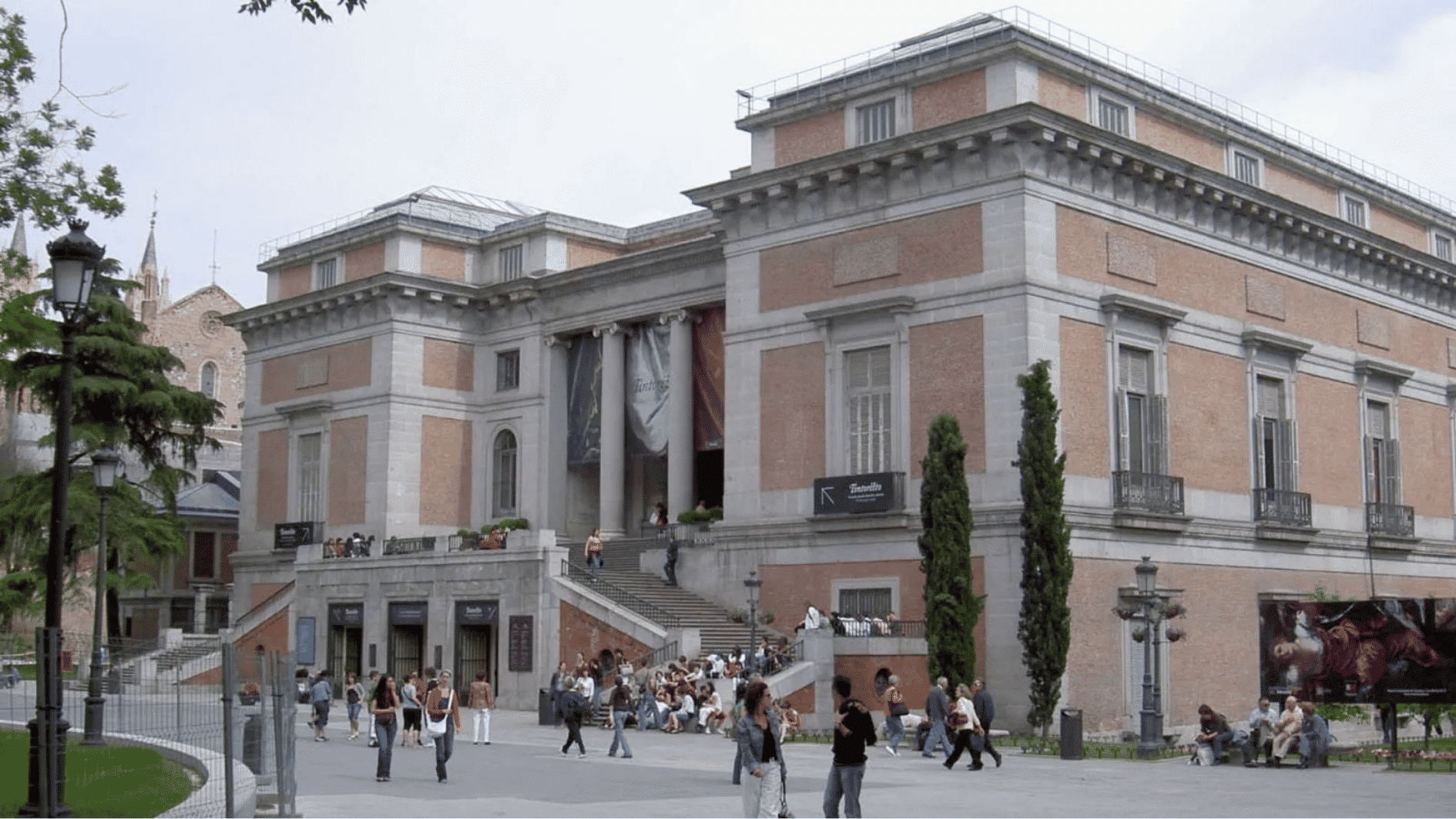 museo nacional del prado in madrid with museum building and people near entrance