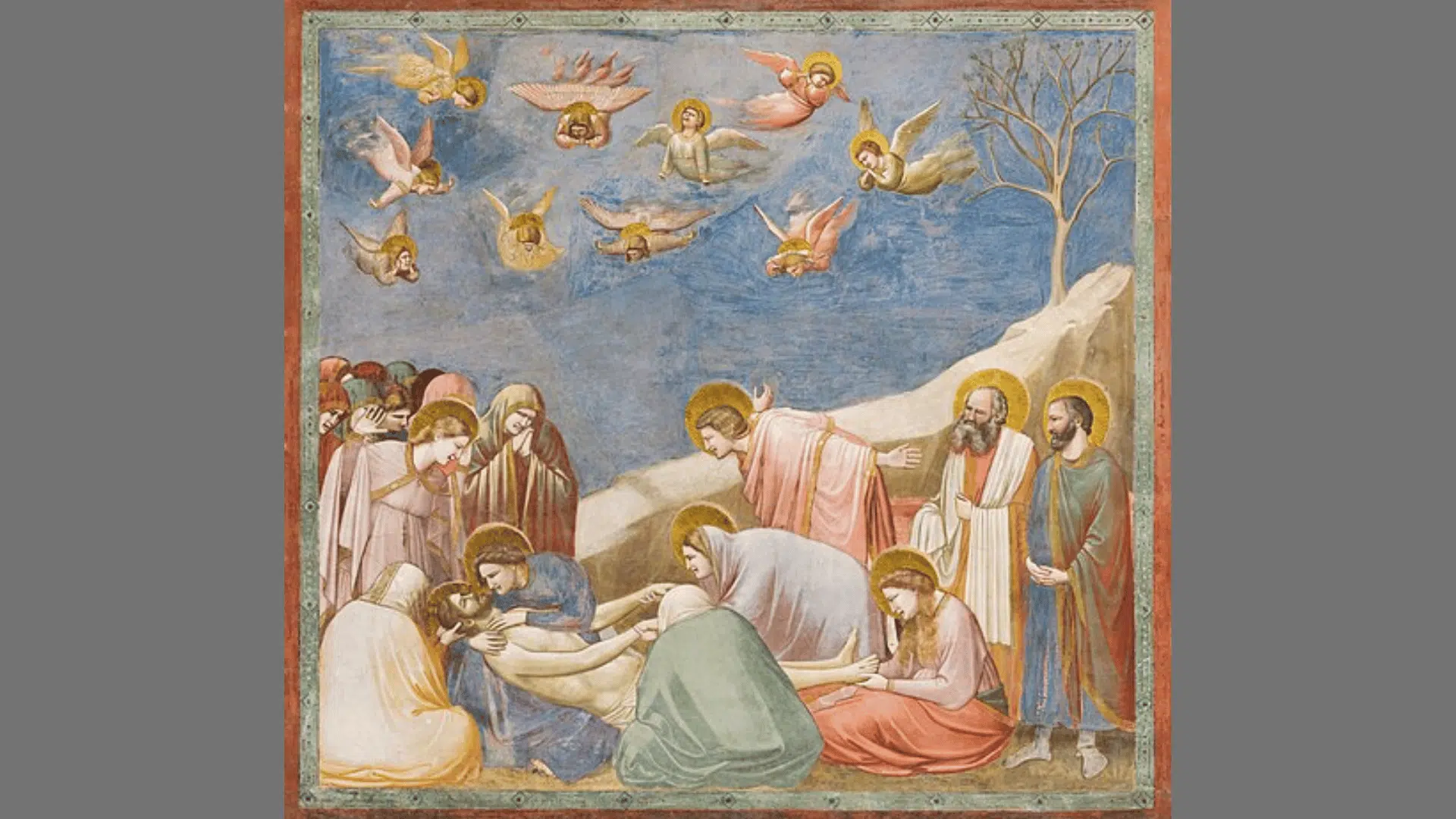Giotto's fresco painting of disciples and crying angels mourning over the dead body of Jesus Christ