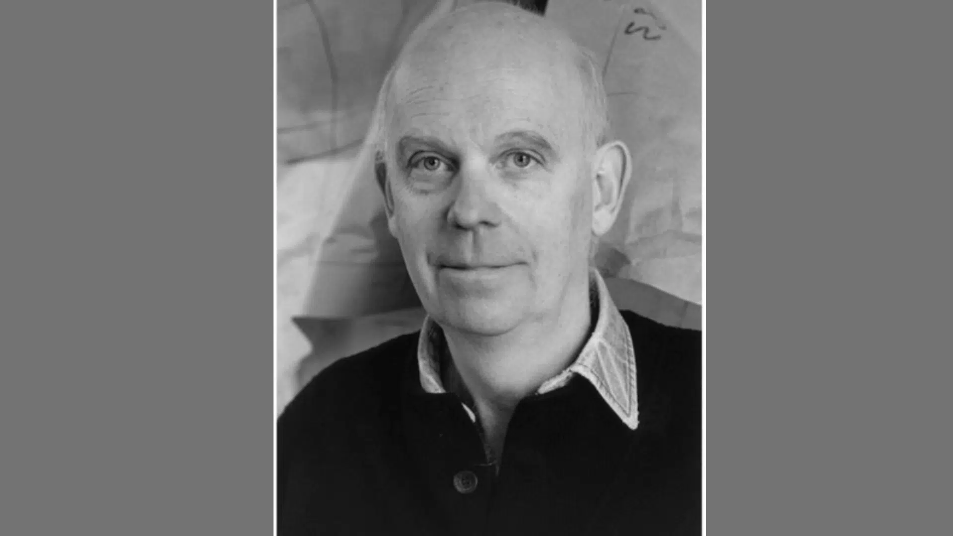 a black and white portrait of pop artist Claes Oldenburg wearing a dark sweater over a collared shirt