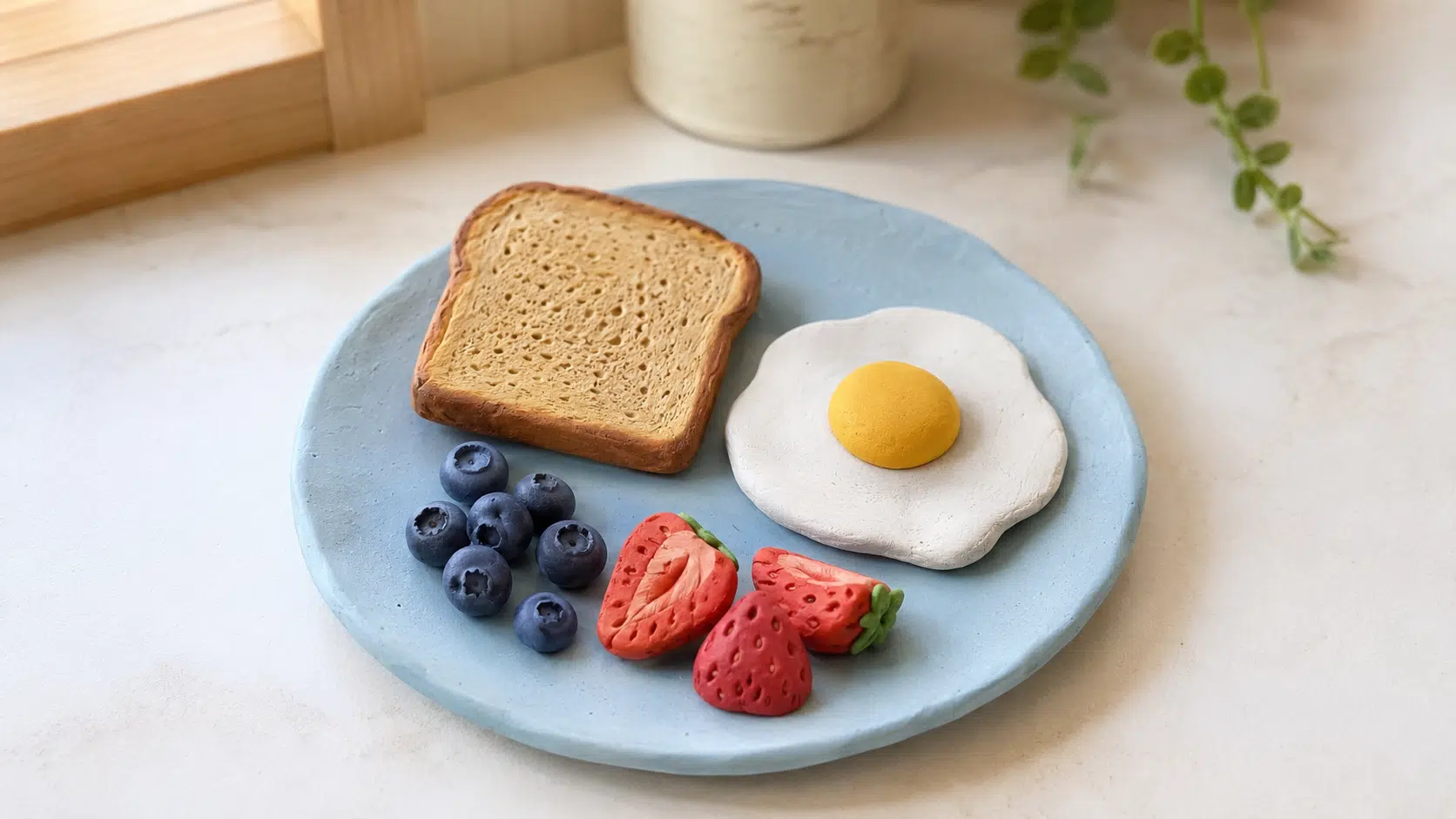 clay breakfast plate with toast egg and colorful berries