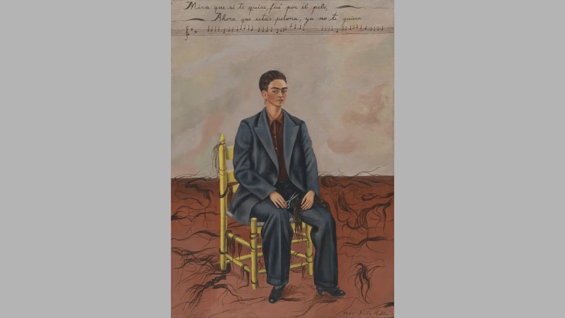 frida kahlo's self-portrait with cropped hair showing her in a dark suit seated among strands of cut hair
