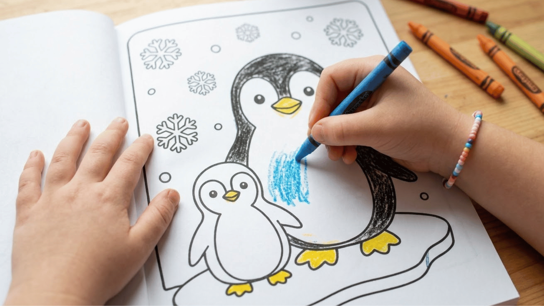a kid coloring penguin coloring page featuring mother penguin and baby penguin