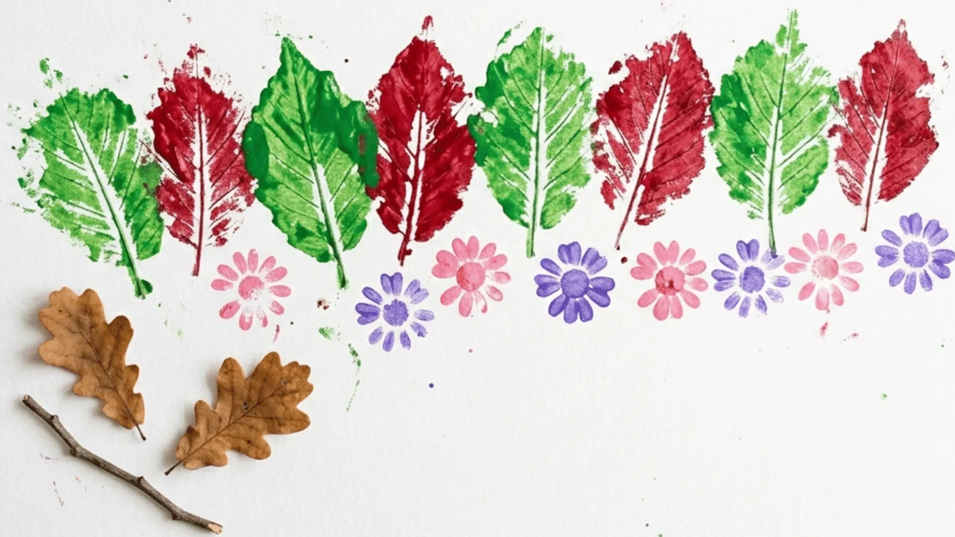 leaf prints and flower stamp patterns in green pink and purple on white paper
