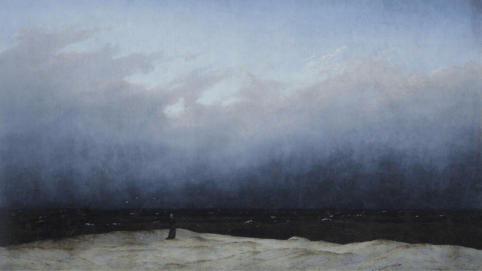 a solitary monk in black stands facing the endless horizon where dark sea meets a vast, brooding sky